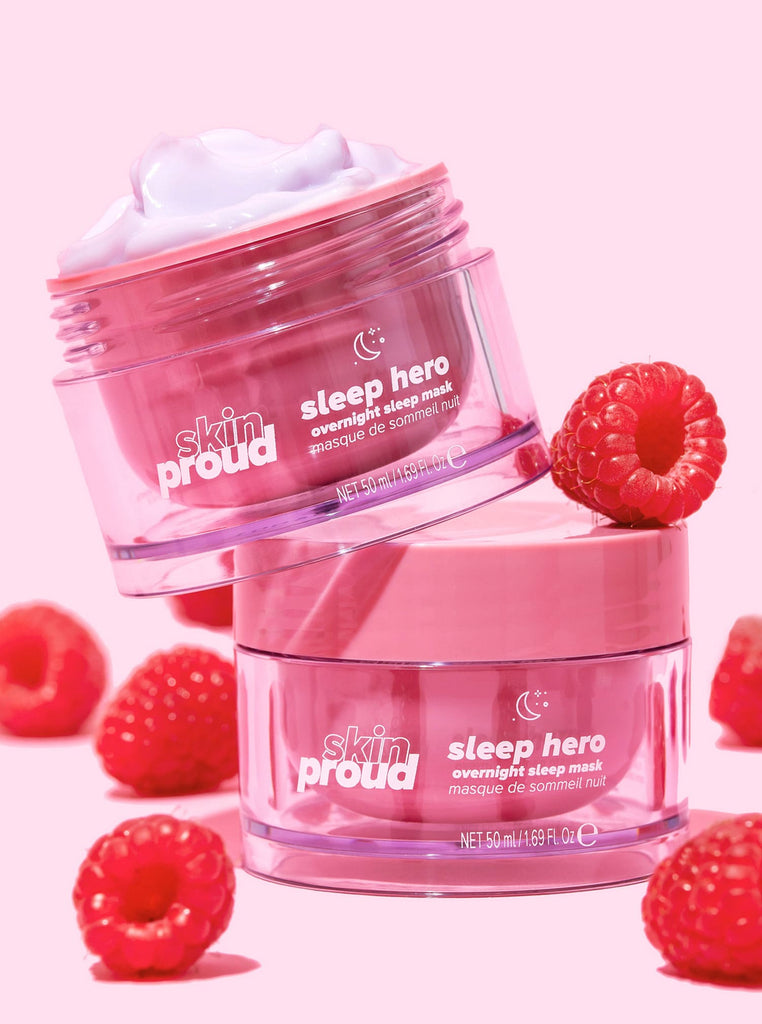 Two containers of Skin Proud Sleep Hero with raspberries