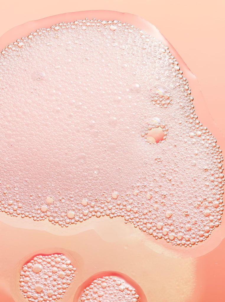 Close up of Skin Proud Fruit Smoothie texture bubbles